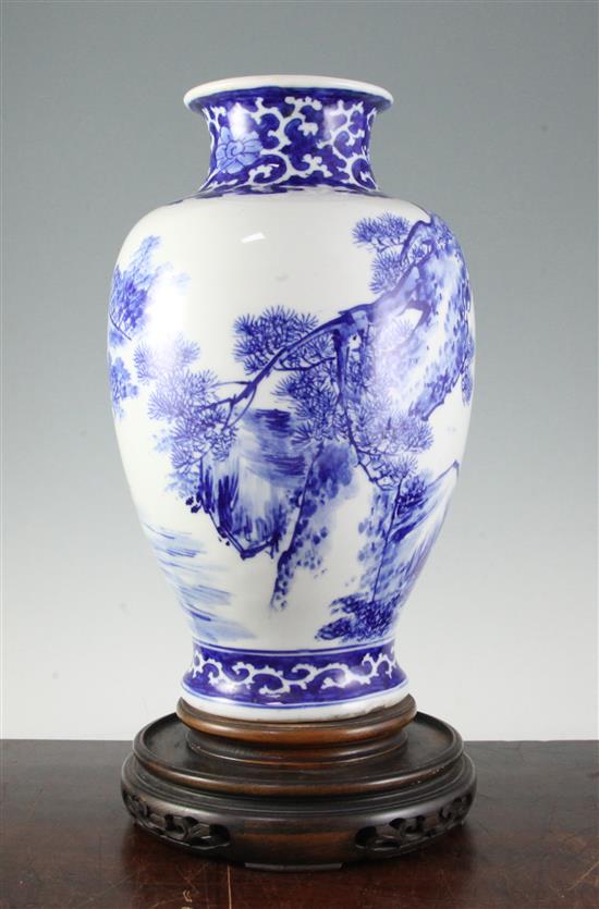 A Chinese porcelain blue and white baluster vase, 13.25in.
